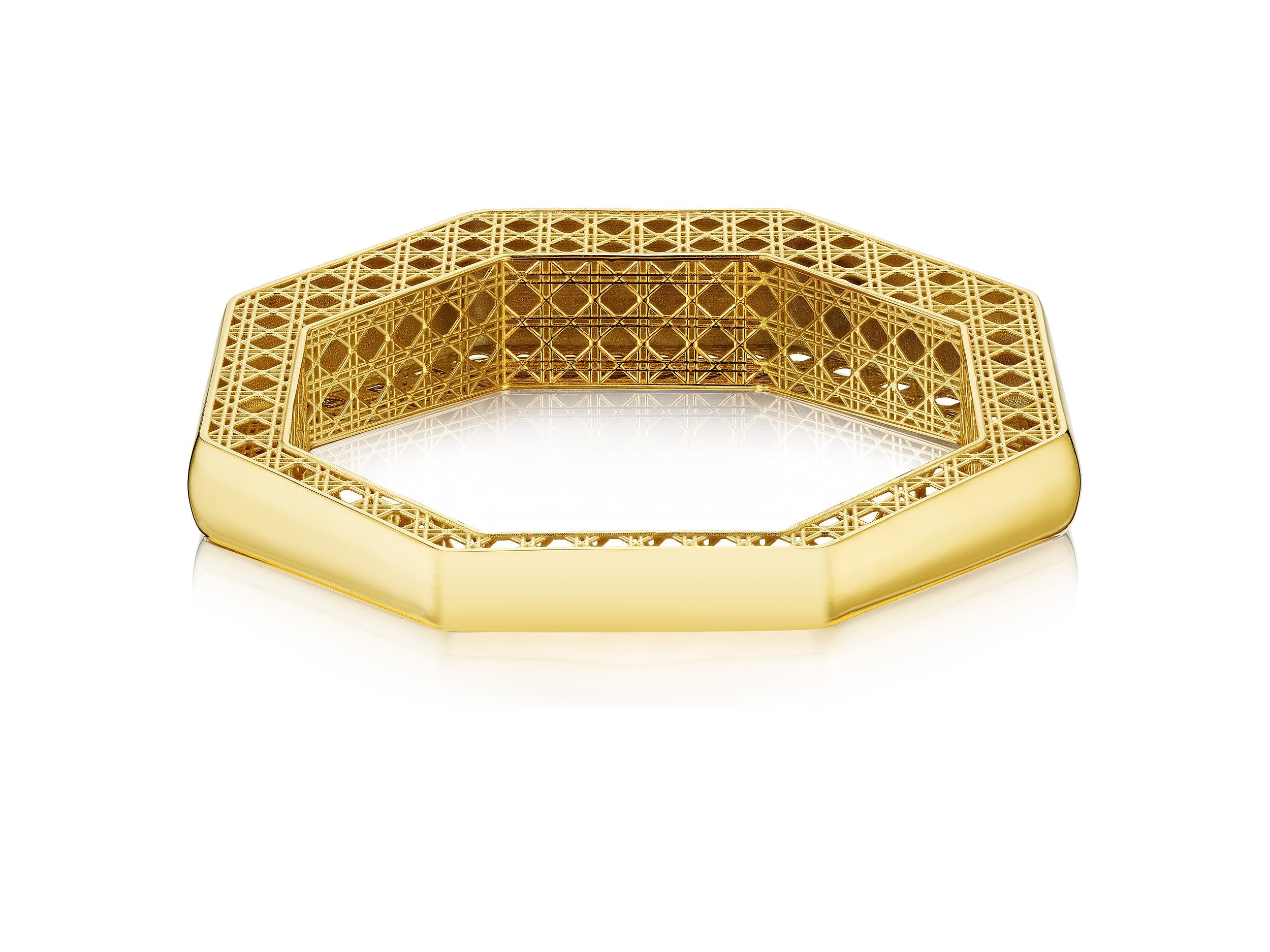 MoAnA LUU Doudou bangle bracelet featuring a cane-woven work inspired by traditional Caribbean fish traps, reflecting the house’s vision of Creole-inspired fine jewelry crafted in New York.