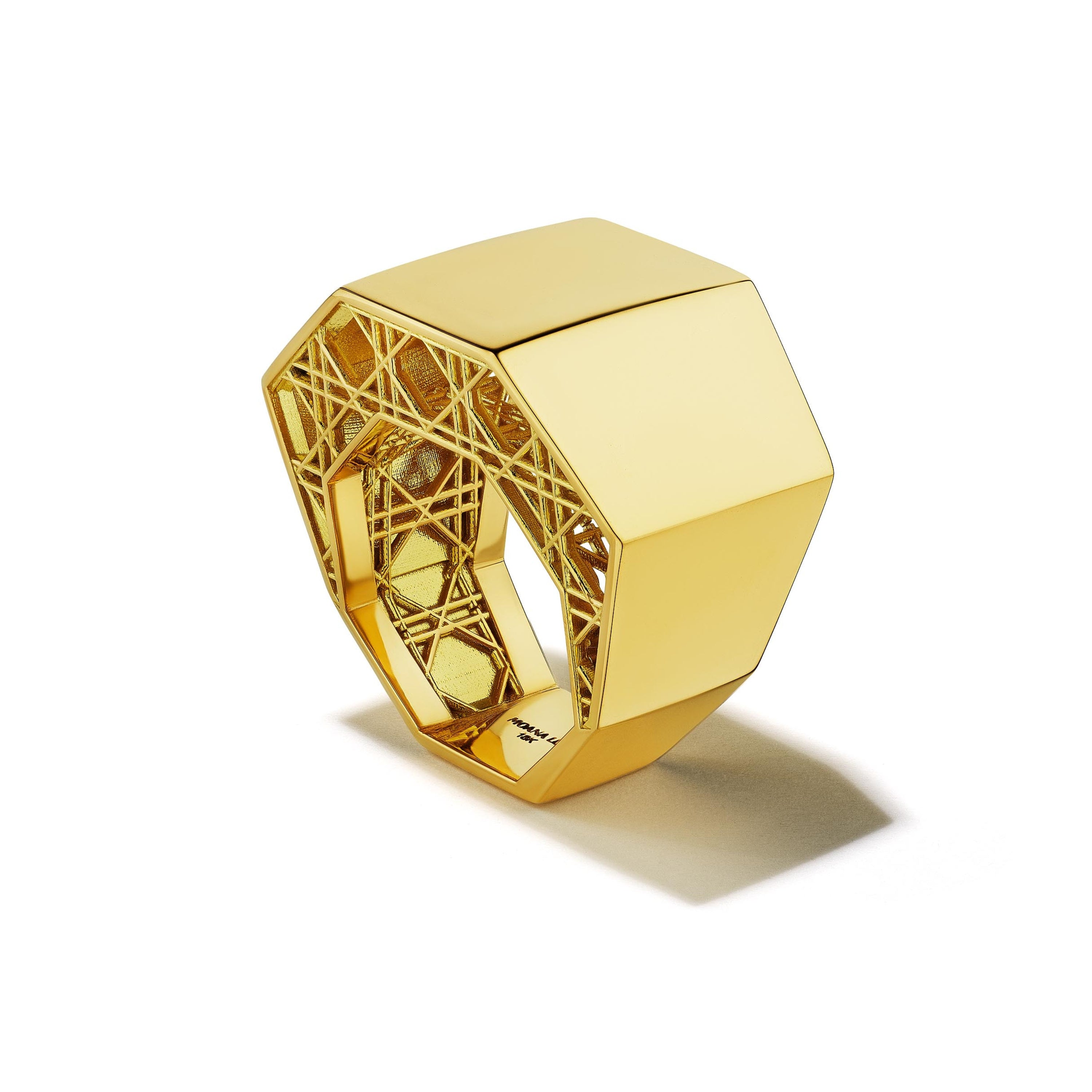 MoAnA LUU Doudou signet ring in 18K yellow gold, featuring a sculptural geometric form with openwork cane-woven interior inspired by Caribbean fish traps.