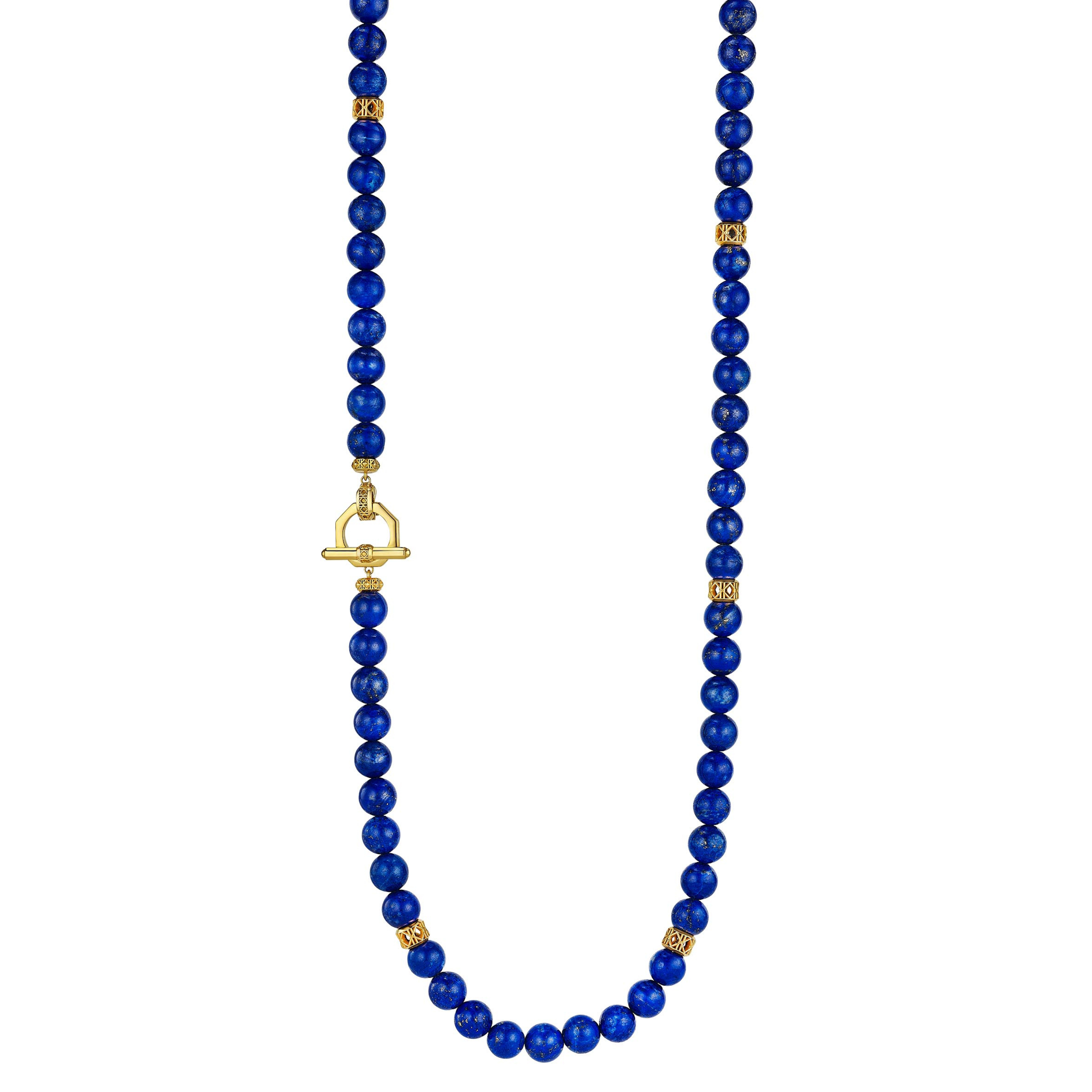 MoAnA LUU Yva bead necklace in lapis lazuli with 18K yellow gold toggle inspired clasp and cane woven gold beads, inspired by traditional Creole bead jewelry.