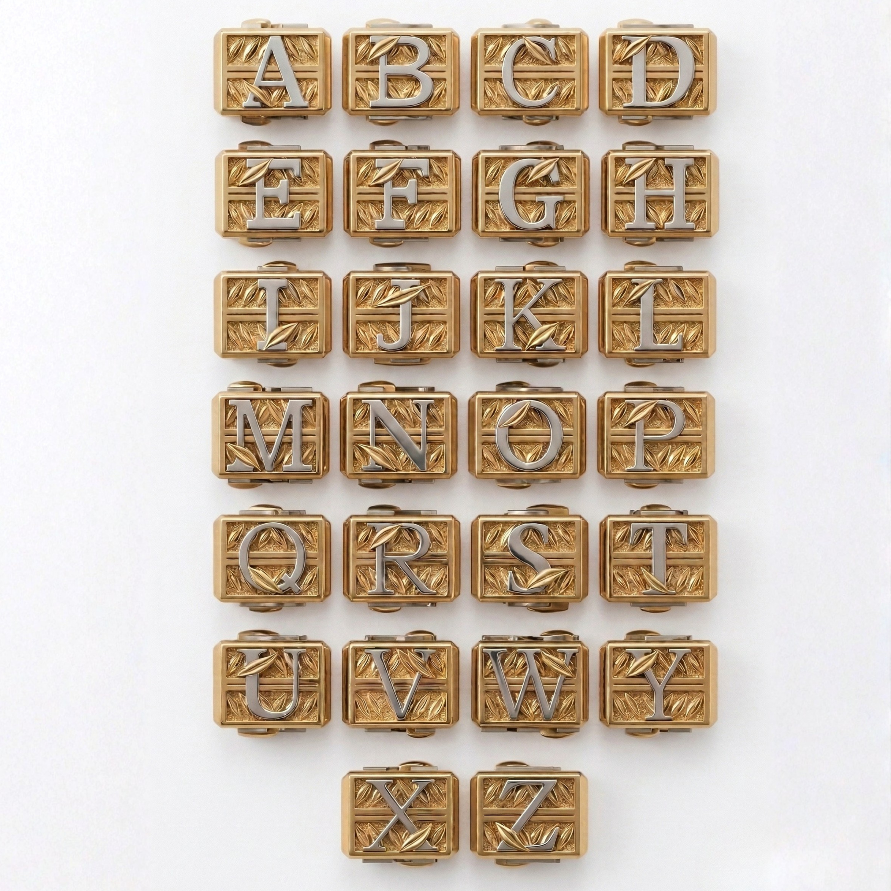 MoAnA LUU Foyal alphabet beads in 18K yellow gold, featuring A–Z monogram charms inspired by the architecture of Fort-de-France and Creole design.