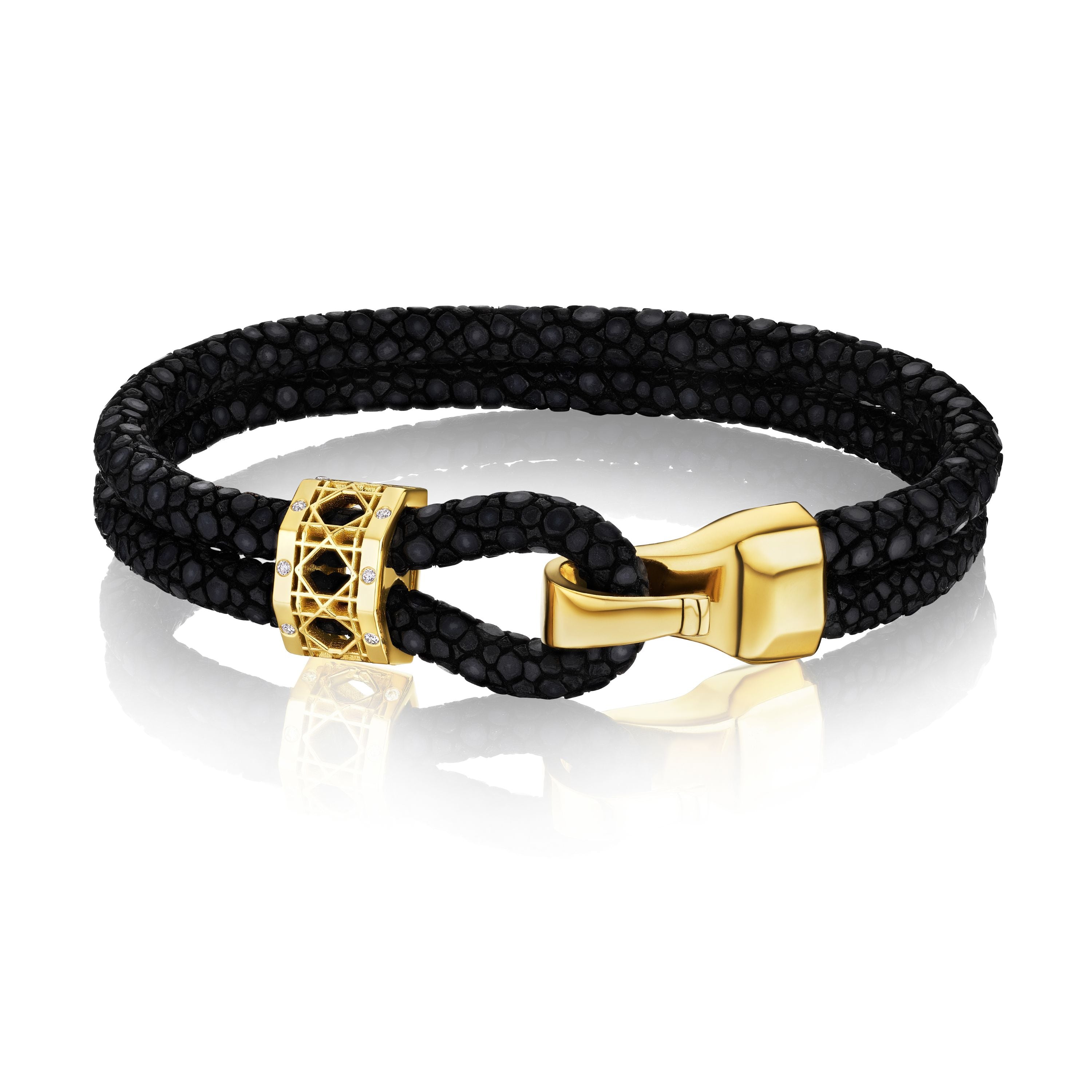 MoAnA LUU Abyss bracelet in 18K yellow gold and diamonds, featuring cane-woven work bead inspired by traditional Caribbean fish traps, reflecting the house’s vision of Creole-inspired fine jewelry crafted in New York.