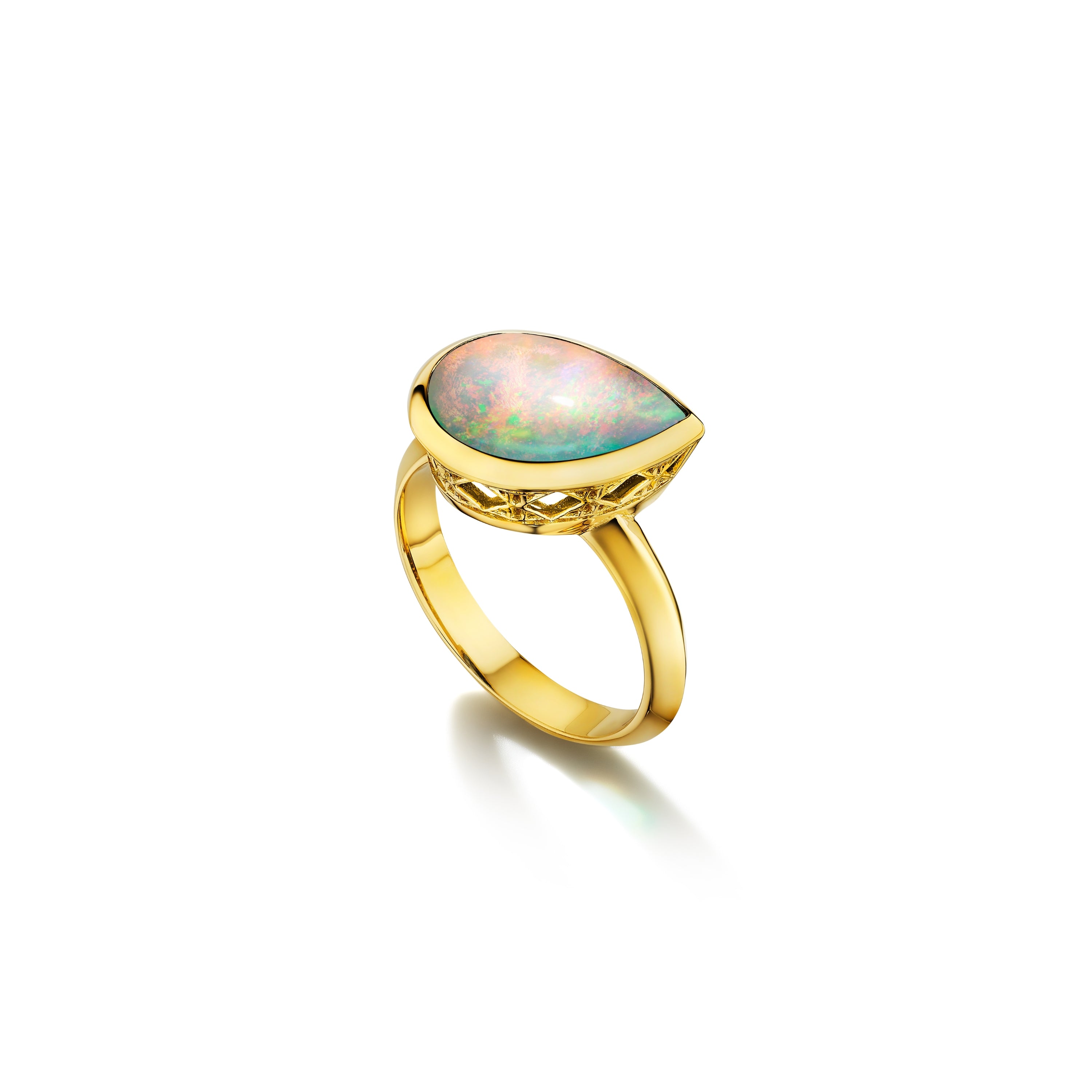 MoAnA LUU Dlo pear-shaped opal ring in 18K yellow gold, featuring a cane-woven frame inspired by traditional Caribbean fish traps, reflecting the house’s vision of Creole-inspired fine jewelry crafted in New York.
