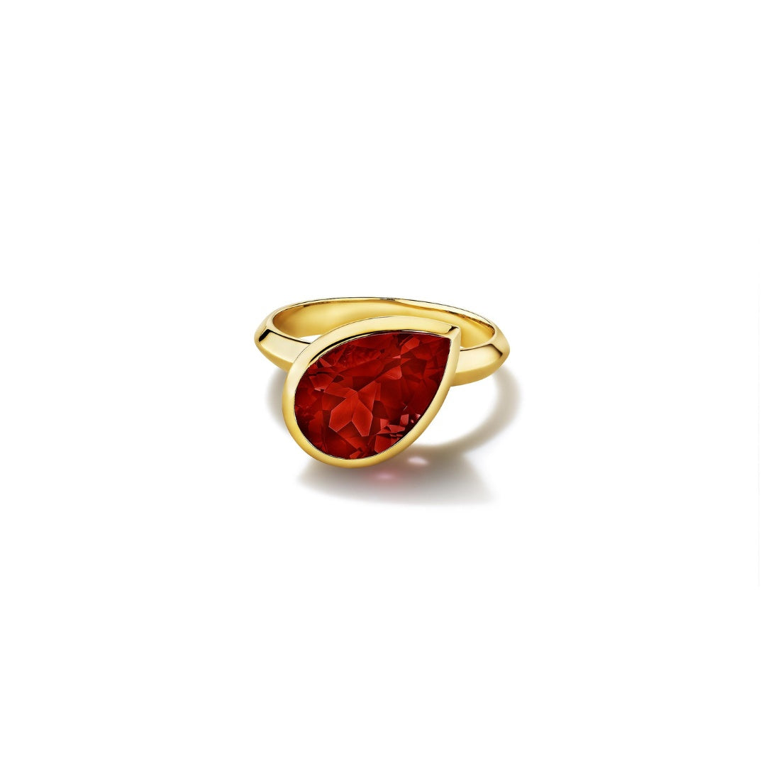 MoAnA LUU Dlo pear-shaped ruby ring in 18K yellow gold, featuring a cane-woven frame inspired by traditional Caribbean fish traps, reflecting the house’s vision of Creole-inspired fine jewelry crafted in New York.