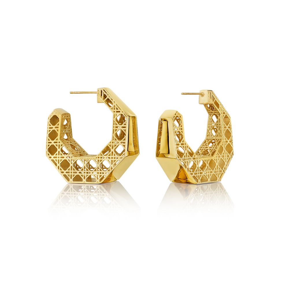 MoAnA LUU Doudou hoop earrings in 18K yellow gold, featuring geometric openwork inspired by Caribbean fish traps.