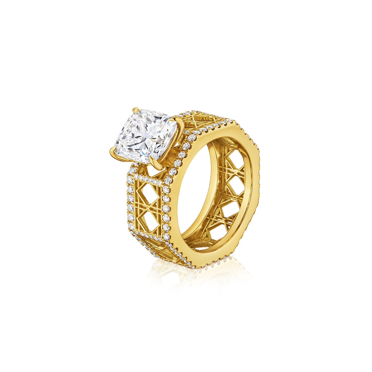 MoAnA LUU Doudou wide engagement ring in 18K yellow gold, pavé diamonds and cushion cut solitaire, featuring cane-woven work inspired by traditional Caribbean fish traps, reflecting the house’s vision of Creole-inspired fine jewelry crafted in New York.
