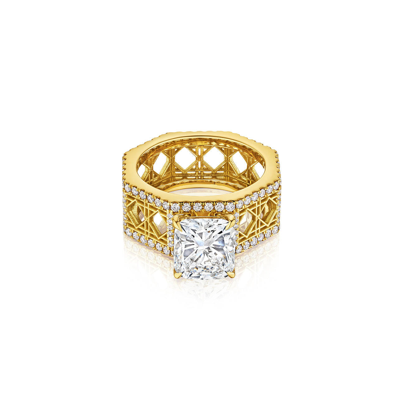 MoAnA LUU Doudou wide engagement ring in 18K yellow gold, pavé diamonds and cushion cut solitaire, featuring cane-woven work inspired by traditional Caribbean fish traps, reflecting the house’s vision of Creole-inspired fine jewelry crafted in New York.