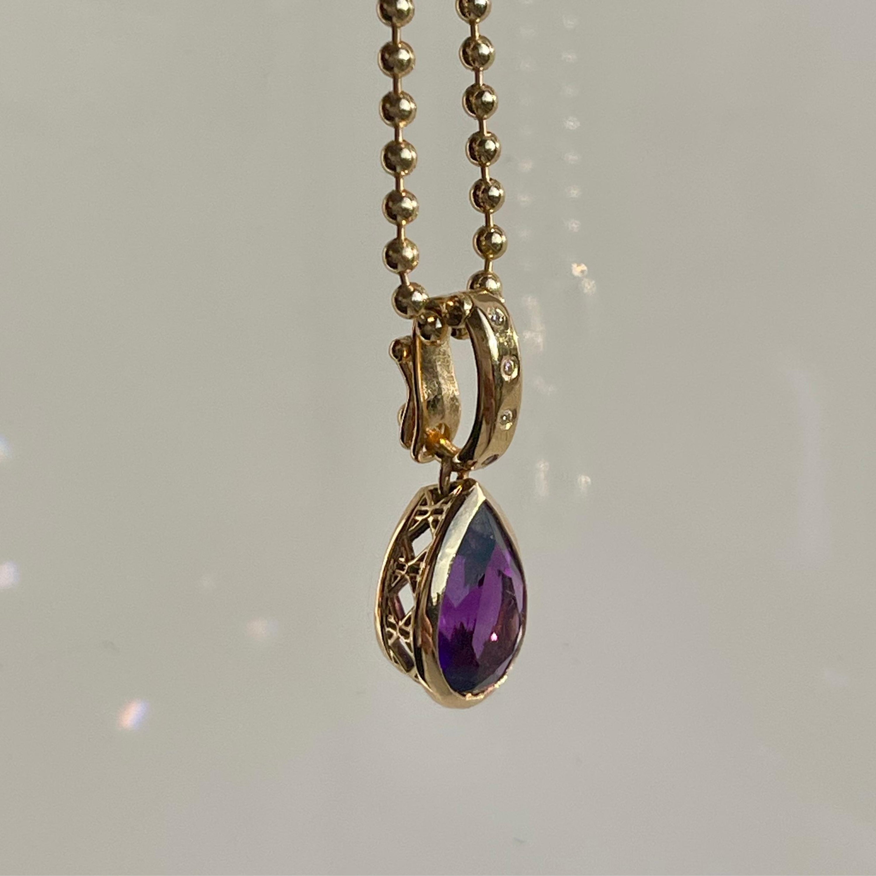 Dlo Pear Shape charm necklace, 18K Yellow Gold, Amethyst and Ti Diamonds on Yva chain