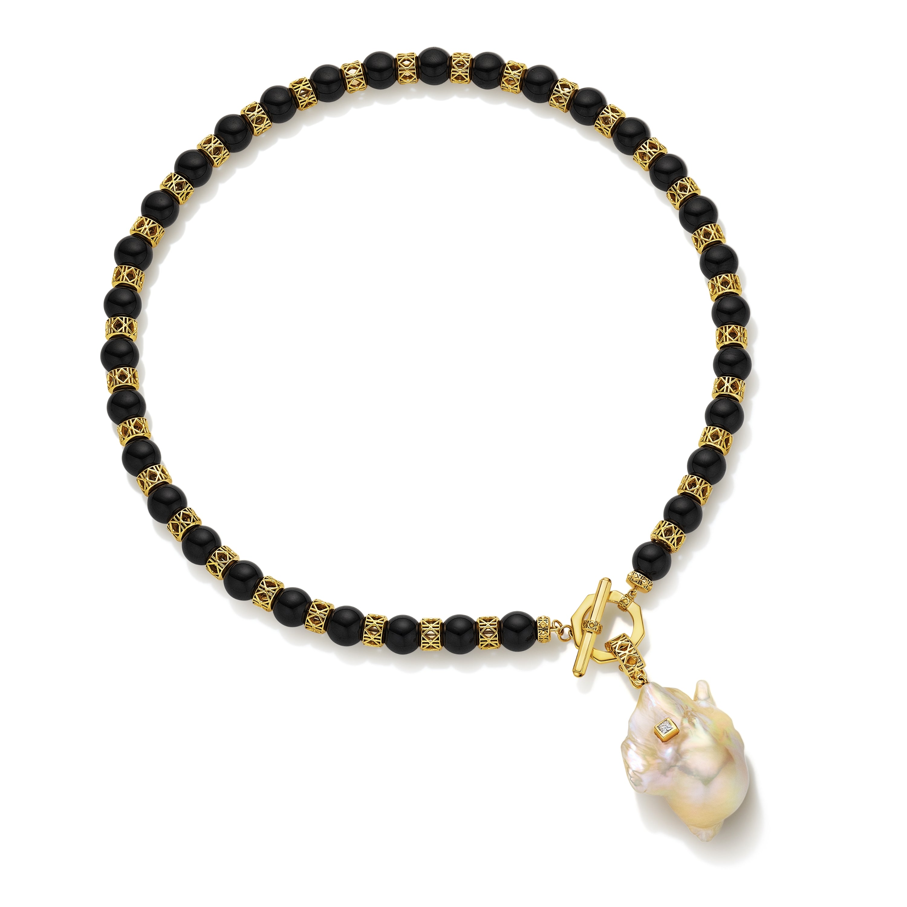 MoAnA LUU Yva bead necklace in black onyx with 18K yellow gold toggle inspired clasp and cane woven gold beads, with Abyss South Sea baroque pearl amulet inspired by traditional Creole bead jewelry.