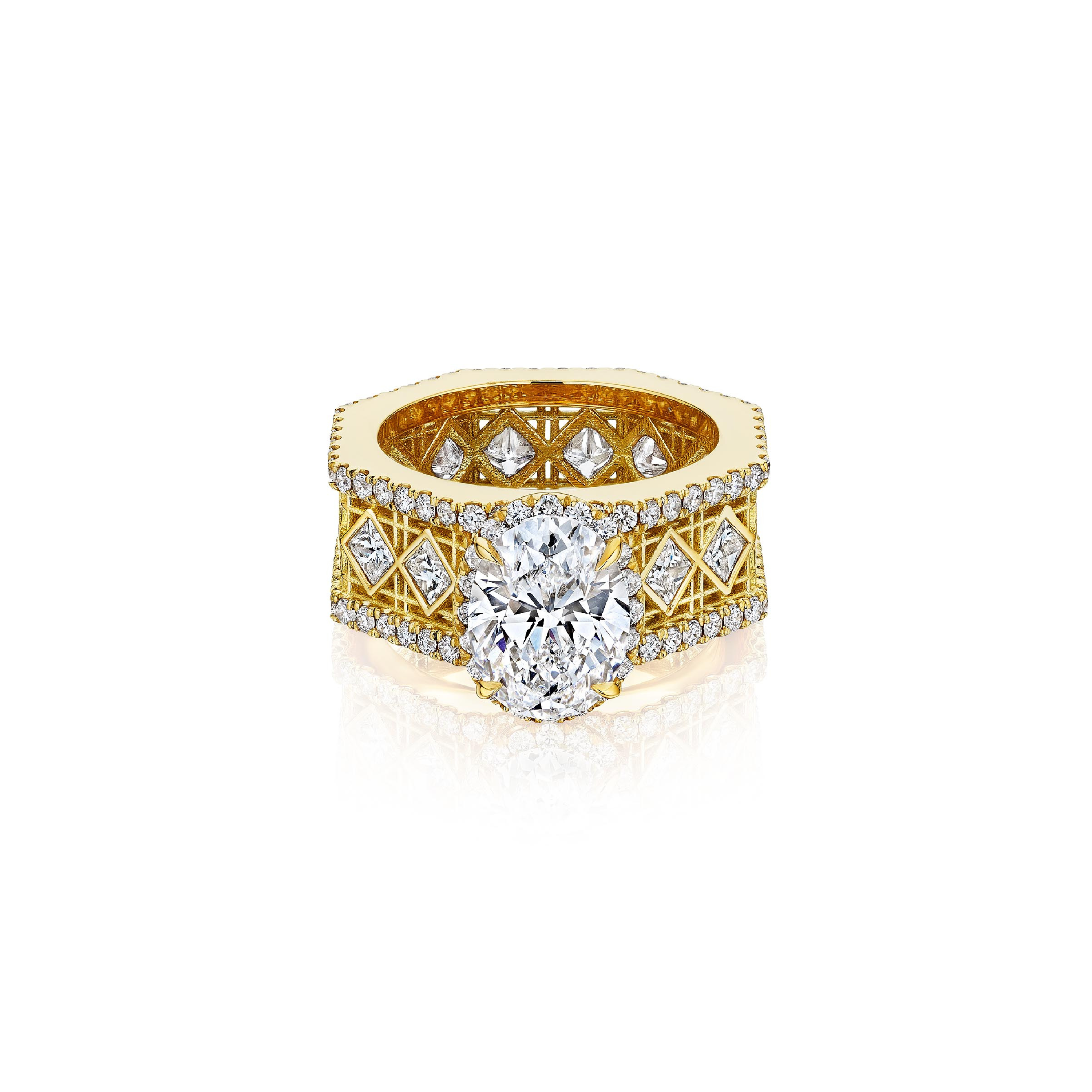 MoAnA LUU Doudou engagement ring with hidden halo, pavé and princess cut diamonds and oval solitaire featuring a cane-woven work inspired by traditional Caribbean fish traps, reflecting the house’s vision of Creole-inspired fine jewelry crafted in New York.