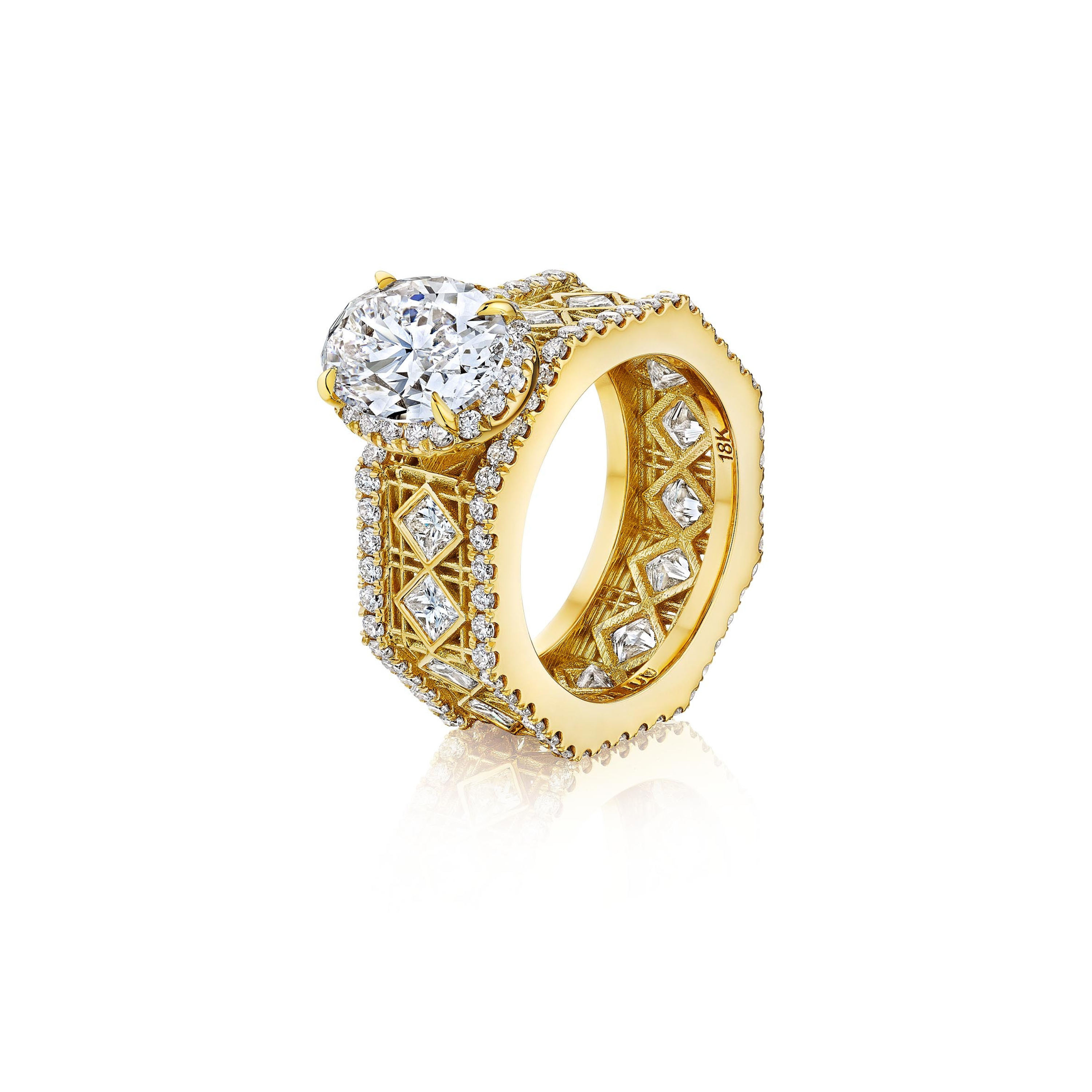 MoAnA LUU Doudou engagement ring with hidden halo, pavé and princess cut diamonds and oval solitaire featuring a cane-woven work inspired by traditional Caribbean fish traps, reflecting the house’s vision of Creole-inspired fine jewelry crafted in New York.