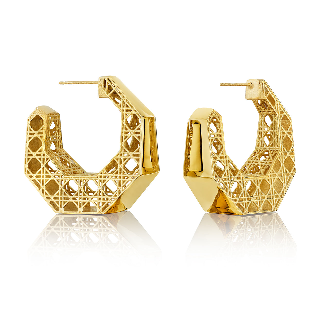 MoAnA LUU Doudou hoop earrings in 18K yellow gold, featuring an intricate woven openwork design inspired by Caribbean fish traps.