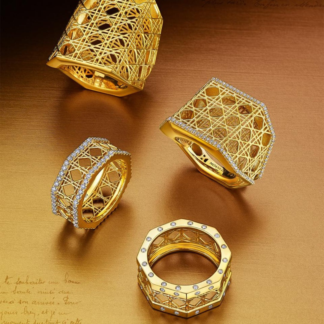 MoAnA LUU Doudou rings in 18K yellow gold, featuring pavé and burnished set diamonds in an intricate woven openwork design inspired by Caribbean fish traps.