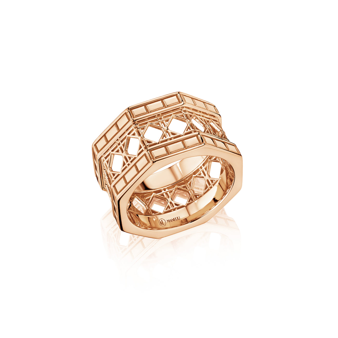 MoAnA LUU Doudou wide band ring in 18K rose gold, featuring intricate geometric openwork  cane design inspired by Caribbean fish traps.