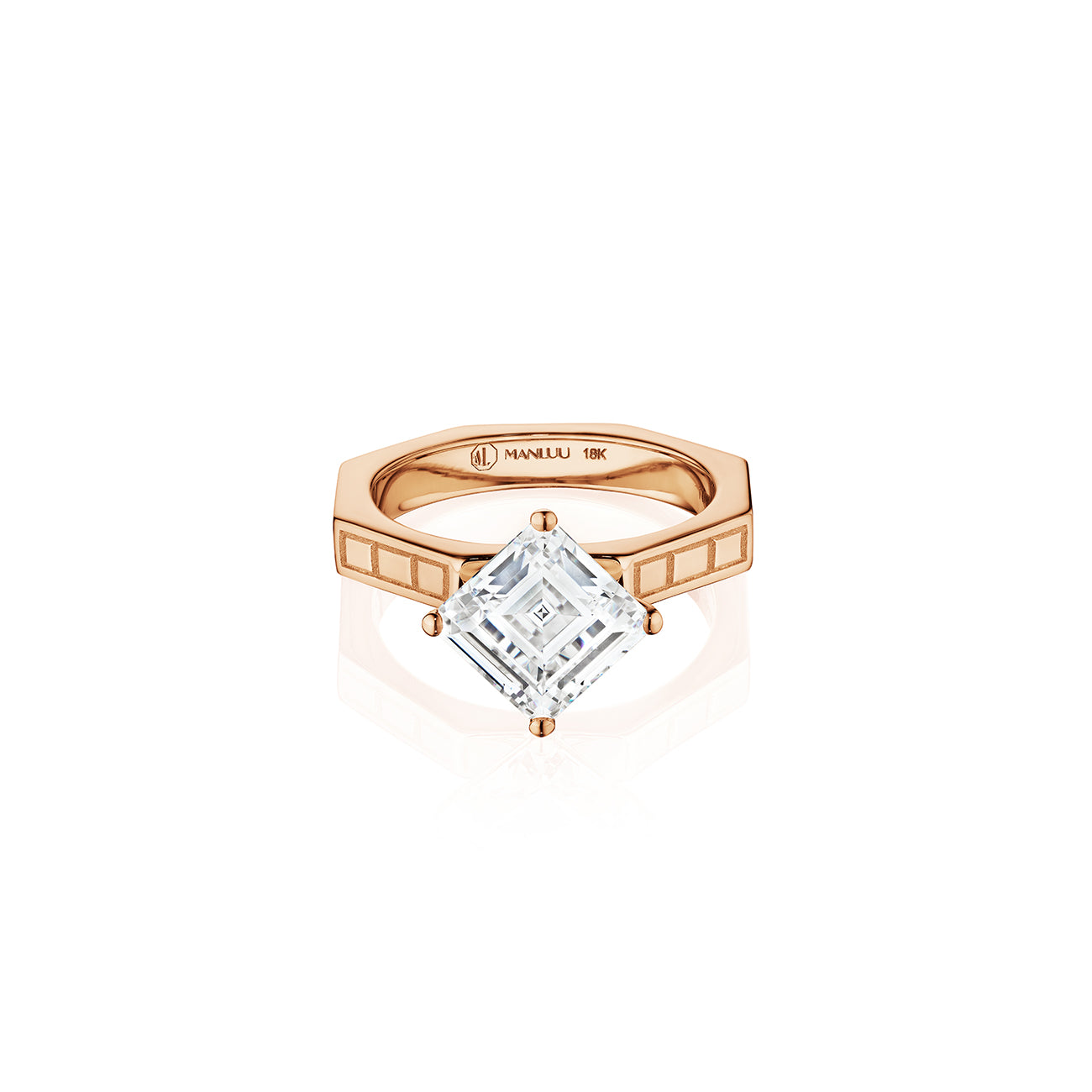 MoAnA LUU Ti engagement ring solitaire  in 18K rose gold in a geometric setting with clean architectural lines.