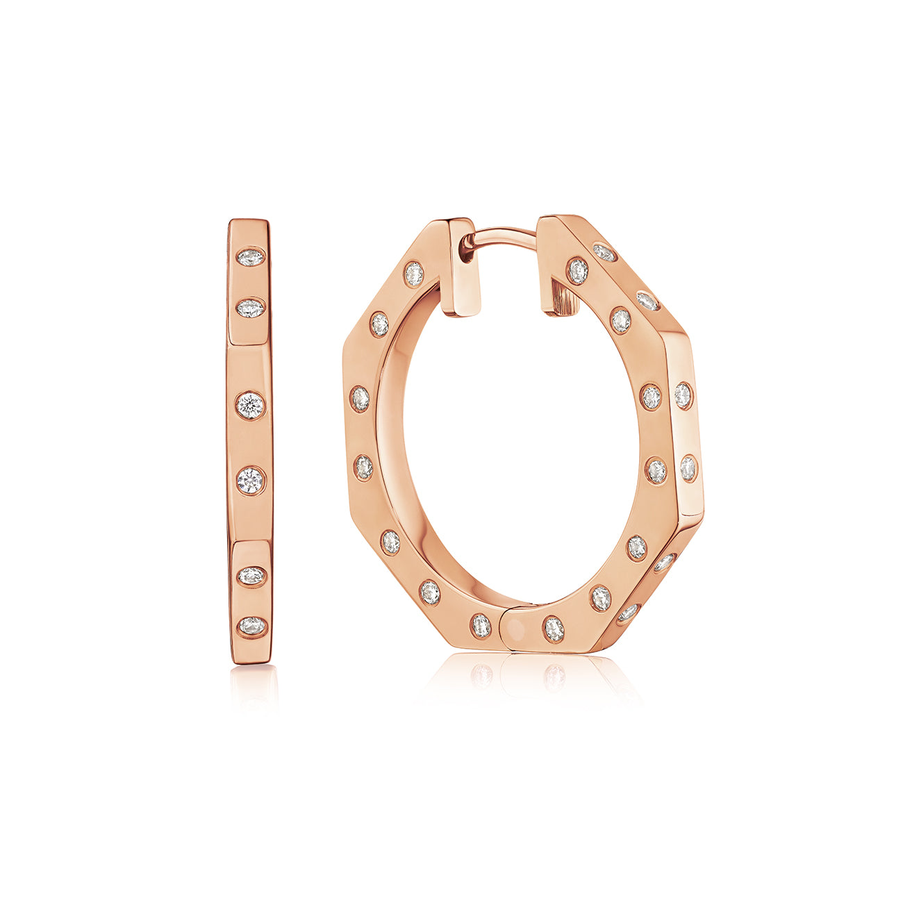 MoAnA LUU Ti hoop earrings in gold with diamond accents, featuring angular geometric design.