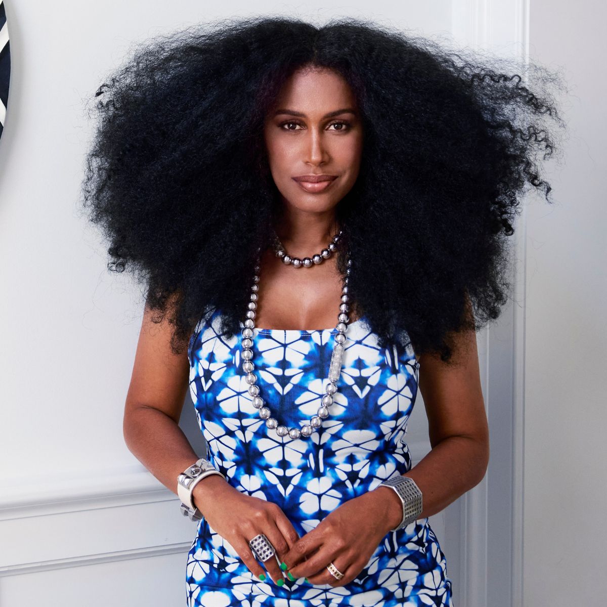 MoAnA LUU wearing MoAnA LUU long bead necklace, Doudou cuff and rings in silver. Inspired by Creole jewelry. 